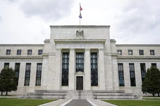 This May 4, 2021, file photo shows the Federal Reserve building in Washington. The Federal Reserve is poised this week to begin unleashing its most drastic steps in three decades to attack inflation by making it costlier to borrow — for a car, a home, a business deal, a credit card purchase — all of which will compound Americans' financial strains and likely weaken the economy. The Fed is expected to announce Wednesday, May 3, 2022 that it will begin quickly shrinking its vast stockpile of T