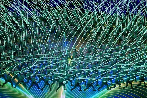 Dancers perform during the opening ceremony of the 2022 Winter Olympics, Friday, Feb. 4, 2022, in Beijing. (AP Photo/Ashley Landis)