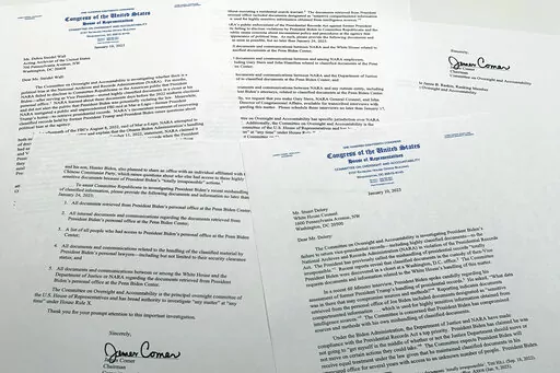 The letters from House Oversight Committee chairman Rep. James Comer, R-Ky., to Debra Steidel Wall, archivist of the United States, and White House Counsel Stuart Delery are photographed Tuesday, Jan. 10, 2023. (AP Photo/Jon Elswick)