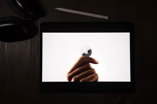 FILE -In this illustration photographed in La Habra, Calif., the AirTag tracking device is introduced during a virtual event held to announce new Apple products, Tuesday, April 20, 2021. Apple and Google on Tuesday, May 2, 2023, disclosed they are teaming up in an effort to thwart unwanted tracking on smartphones through Bluetooth devices designed to help people find their keys, keep tabs on their luggage and locate other things they don’t want to line. The two companies behind the iPhone and 