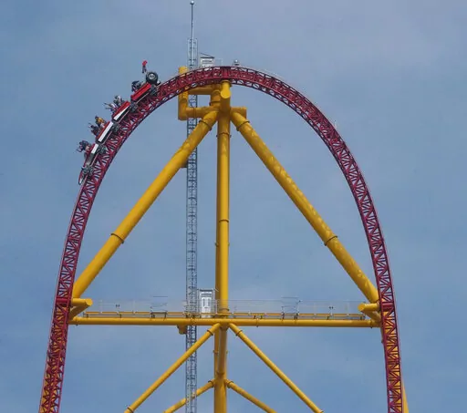 Riders on the Top Thrill Dragster speed along on May 1, 2003, at Cedar Point Amusement Park, in Sandusky, Ohio. The amusement park in Ohio is permanently closing the world’s second-tallest roller coaster. The decision announced Tuesday, Sept. 6, 2022, by Cedar Point comes a year after a small metal object flew off the 420-foot (128-meter) tall Top Thrill Dragster coaster and struck a woman in the head at the park in Sandusky. (AP Photo/Paul M. Walsh, File)
