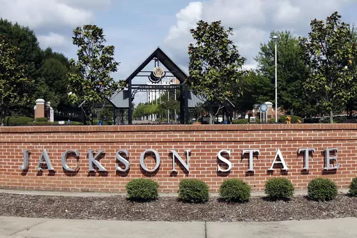 A sign marks the west entrance at Jackson State University in Jackson, Miss., May 31, 2017. Higher education officials in Mississippi voted Thursday, Nov. 16, 2023, to name Marcus L. Thompson as new president of Jackson State University, the state's largest historically Black university. (AP Photo/Rogelio V. Solis, File)