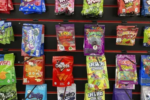 Products advertised as containing synthetically derived delta-8 THC are offered for sale at a smoke shop in north Seattle on Feb. 25, 2022. (AP Photo/Gene Johnson, File)