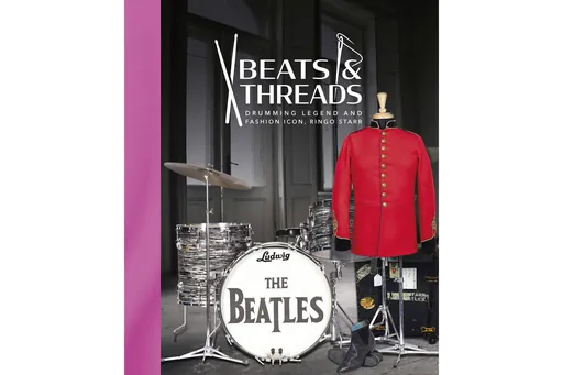 This cover image released by Julien's Auctions shows "Beats & Threads" by Ringo Starr, an illustrated journey through the former Beatles drummer's career, featuring images of everything from his drum kits to his trend-setting wardrobe. The 312-page book is being sold through the publishing division of Julien's Auctions. (Julien's Auctions via AP)