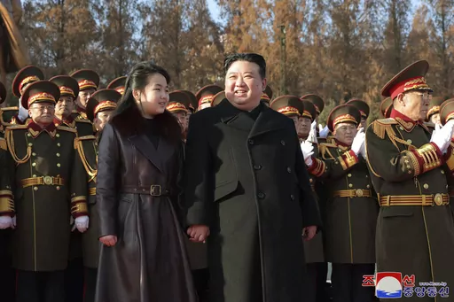 In this photo provided by the North Korean government, its leader Kim Jong Un and his daughter visit the defense ministry for events to celebrate the 76th founding anniversary of the country's army in North Korea, Thursday, Feb. 8, 2024. Independent journalists were not given access to cover the event depicted in this image distributed by the North Korean government. The content of this image is as provided and cannot be independently verified. Korean language watermark on image as provided by s