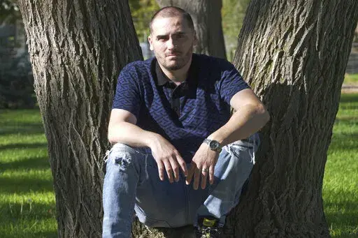 Weldon Angelos poses for a photograph Saturday, Oct. 8, 2022, in West Jordan, Utah.  President Joe Biden’s executive action pardoning Americans with federal convictions for simple marijuana possession will benefit thousands of people by making it easier for them to find housing, get a job or apply to college. Angelos, whose 2003 federal case for selling $300 worth of marijuana to a confidential informant in Utah got him sentenced to 55 years in prison, said he knows many people who will benefi