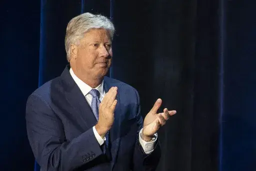 Pastor Robert Morris applauds during a roundtable discussion at Gateway Church Dallas Campus, Thursday, June 11, 2020, in Dallas. (AP Photo/Alex Brandon, File)
