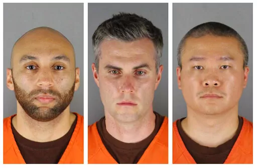 This combination of photos provided by the Hennepin County Sheriff's Office in Minnesota on June 3, 2020, shows, from left, former Minneapolis police officers J. Alexander Kueng, Thomas Lane and Tou Thao. The former policer officers are on trial in federal court accused of violating Floyd's civil rights as fellow Officer Derek Chauvin killed him. Judge Paul Magnuson abruptly recessed on Wednesday, Feb. 2, 2022 after one of the defendants tested positive for COVID-19. (Hennepin County Sheriff's O