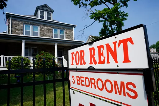 A sign indicating the availability of a home to rent stands outside a building in Philadelphia, Wednesday, June 22, 2022. House flipping, “house hacking” and vacation rentals have skyrocketed in popularity in recent years, becoming a distinctly millennial way of generating passive income in an uncertain economy. The potential profit is tempting, but is it worth the time and money? Ongoing repairs and responsibility to tenants can make renting a major undertaking, so know your financial and p