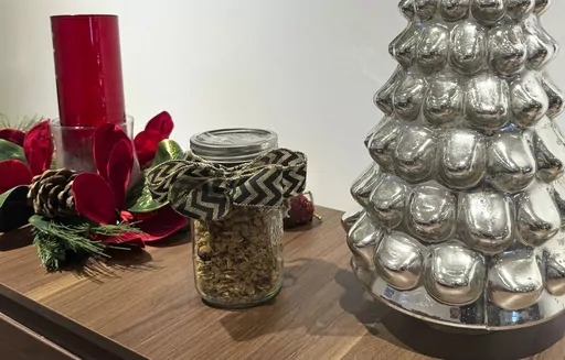 This Dec. 19, 2023 image shows a jar of homemade granola given as a gift in Larchmont, New York. (Julia Rubin via AP)