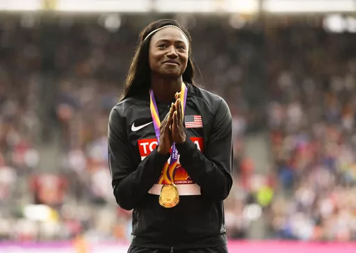 United States' Tori Bowie gestures after receiving the gold medal she won in the women's 100m final during the World Athletics Championships in London, Monday, Aug. 7, 2017. Tori Bowie, the sprinter who won three Olympic medals at the 2016 Rio de Janeiro Games, has died, her management company and USA Track and Field said Wednesday, May 3, 2023. Bowie was 32. She was found Tuesday in her Florida home. No cause of death was given. (AP Photo/Alastair Grant, File)