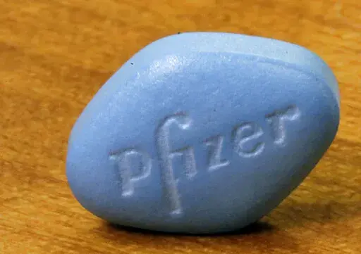 In this Monday, Dec. 4, 2017, photo, Pfizer's Viagra, is photographed at Pfizer Inc. headquarters in New York.   On Friday, Jan. 14, 2022, The Associated Press reported on stories circulating online incorrectly claiming Viagra can cure COVID-19. (AP Photo/Richard Drew)