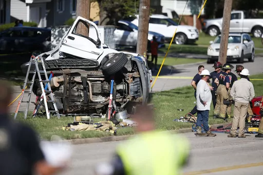 Emergency workers work the scene of a fatal accident on Aug. 24, 2021 in Tulsa, Okla. Nearly 43,000 people died in U.S. traffic crashes in 2021, with deaths due to speeding and impaired or distracted driving on the rise. The 2021 final numbers, released Monday, April 3, 2023 by the National Highway Traffic Safety Administration, confirmed earlier estimates showing a 10.5% increase in deaths over 2020. (Michael Noble Jr./Tulsa World via AP, File)