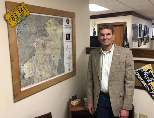 Oregon state Sen. Dennis Linthicum, R-Klamath Falls, poses in his office in the Oregon State Capitol in Salem, Ore., on Feb. 8, 2019. A federal judge on Wednesday, Dec. 13, 2023, rejected a request from Oregon Republican state senators who boycotted the Legislature to be allowed on the ballot after their terms end. State Sens. Dennis Linthicum, Brian Boquist and Cedric Hayden filed the federal lawsuit to challenge their disqualification from running for reelection under Measure 113. (AP Photo/An